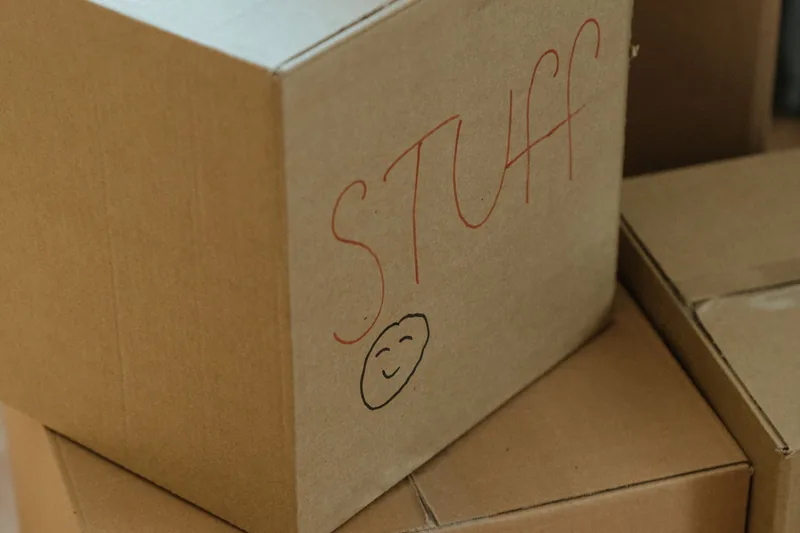 Packed cardboard boxes stacked ready to go