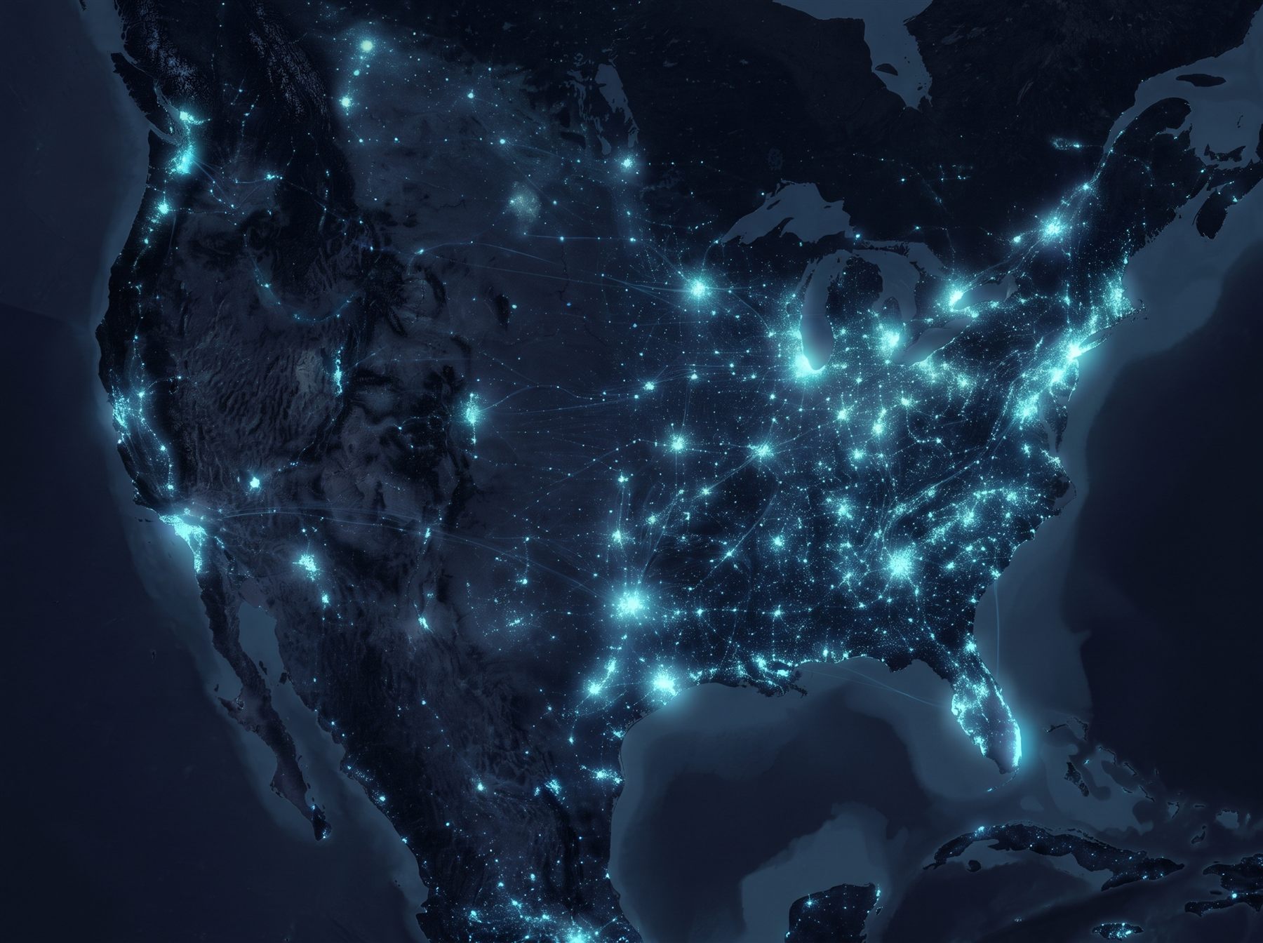 A dark satellite-style map of North America with city lights glowing cyan across the United States